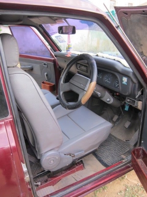 Mazda Familia 1.3 ปี 1995 สีแดงเลือดหมู