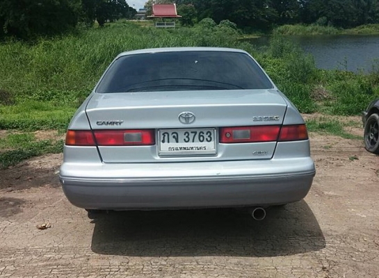 toyota camry ตัวท๊อป สีบรอนฟ้า