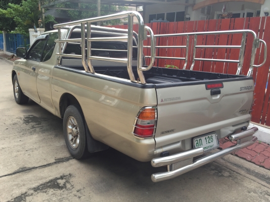 ขายปิคอัพมิตซูบิชิสตราด้าเครื่อง 2800 เกียร์ออโต้ ปี2000 สีทอง ราคา 140,000บาท เจ้าของขายเอง