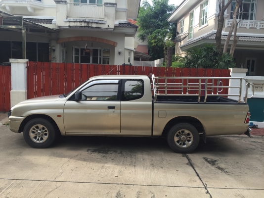 ขายปิคอัพมิตซูบิชิสตราด้าเครื่อง 2800 เกียร์ออโต้ ปี2000 สีทอง ราคา 140,000บาท เจ้าของขายเอง
