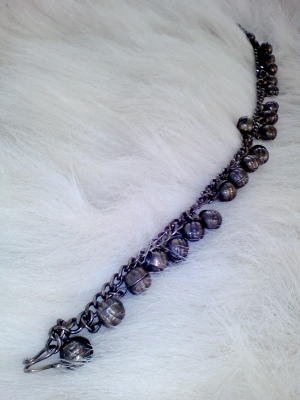 กระพรวนเงินเก่า