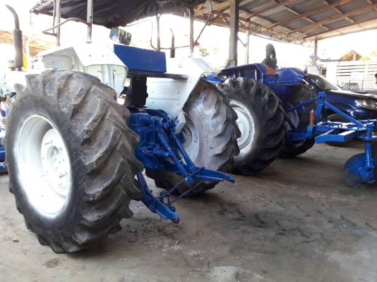 (ลดสุดๆไปเลย)ขายรถไถฟอร์ด 2 คัน T1 77 และ 6600 T5 พร้อมอุปกรณ์ ใบมีดดันหน้า ผาน 7 และผาน3 ทะเบียนพร้อมโอนทั้ง 2 คัน