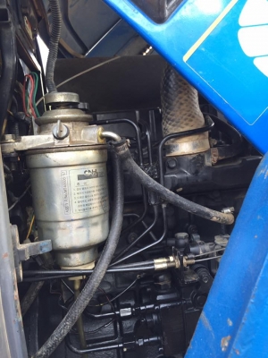 รถแทรกเตอร์ NEW HOLLAND พร้อมอุปกรณ์ 3 ชิ้น รถแทรกเตอร์ NEW HOLLAND พร้อมอุปกรณ์ 3 ชิ้น