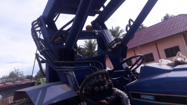 รถคีบอ้อย