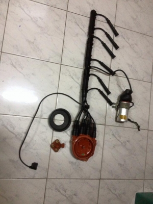 ขายชุดจุดระเบิดm20 6สูบ มีสายหัวเทียน คอยจุดระเบิด ชุดกะลา สภาพใหม่ ราคา2900 โทร0924462525โส กทม