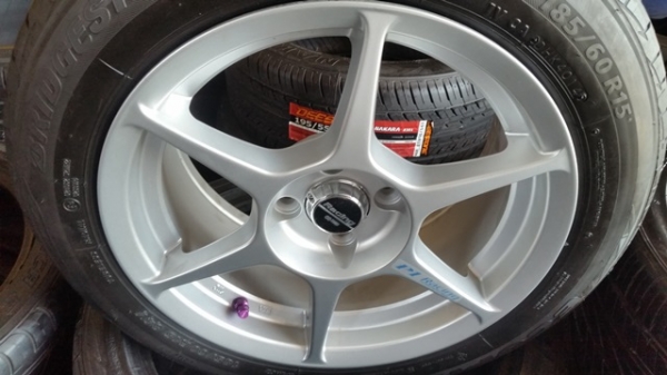 ขายล้อใหม่P1 ขอบ15 4รู100 หน้า7 พร้อมยาง\% ปี14  4 ล้อ