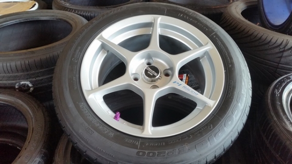 ขายล้อใหม่P1 ขอบ15 4รู100 หน้า7 พร้อมยาง\% ปี14  4 ล้อ