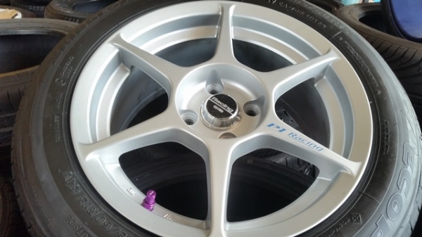 ขายล้อใหม่P1 ขอบ15 4รู100 หน้า7 พร้อมยาง\% ปี14  4 ล้อ