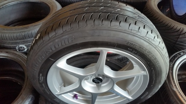 ขายล้อใหม่P1 ขอบ15 4รู100 หน้า7 พร้อมยาง\% ปี14  4 ล้อ