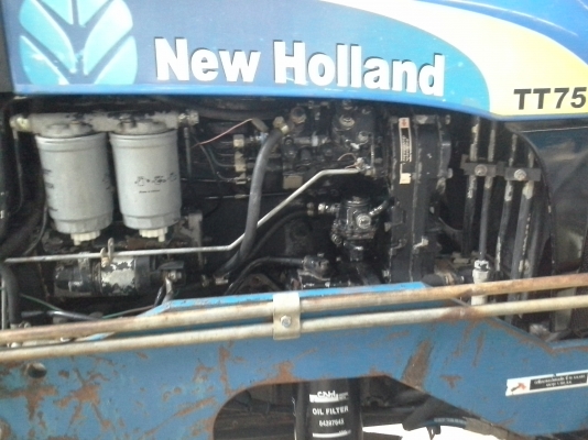 ขายรถไถนิวฮอแลน TT 75 เอกสารอินวอยสองเพาดันหน้า หางสามสภาพสวยพร้อมใช้