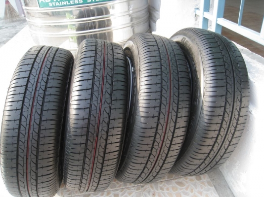 ขายกะทะล้อ nissan almera 14" 4/100 +ฝาครอบ+ยางปี13(081-3747940)