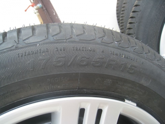 ขายกะทะล้อ Honda jazz ขอบ15 4/100 +ฝาครอบ + ยางปลายปี12 ( 081-3747940)