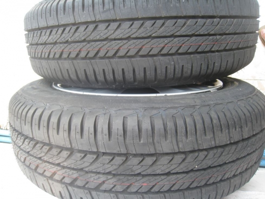 ขายกะทะล้อ Honda jazz ขอบ15 4/100 +ฝาครอบ + ยางปลายปี12 ( 081-3747940)