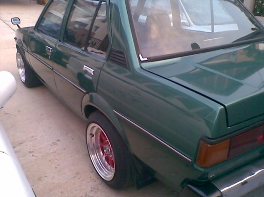 ขายรถ TOYOTA KE70  DX สีเขียว 4ประตู เครือง 4K ล้อแม็กขอบ 15 XXR กว้าง8นิ้ว สีแดง