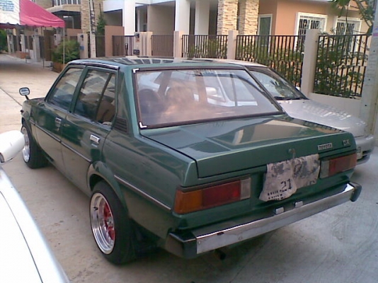 ขายรถ TOYOTA KE70  DX สีเขียว 4ประตู เครือง 4K ล้อแม็กขอบ 15 XXR กว้าง8นิ้ว สีแดง