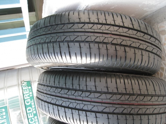 ขายกะทะล้อ nissan almera 14" 4/100 +ฝาครอบ+ยางปี13(081-3747940)