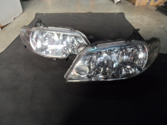 ขาย ไฟหน้ารถยนต์ ซีนอล มาสด้า 323 โปทีเจ้ Mazda 323 Protege xenon ของแท้