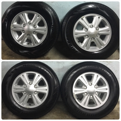 แม็กพร้อมยางป้ายแดง ISUZU 215-70-15 แม็กพร้อมยางป้ายแดง ISUZU 215-70-15