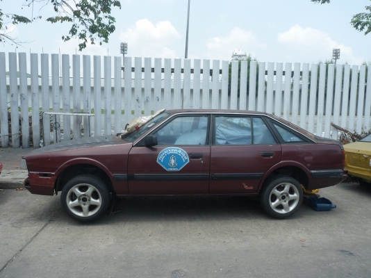 ต้องการขายรถยนต์มาสด้าแดงเพลิงสาพเก่ามากพร้อมใช้