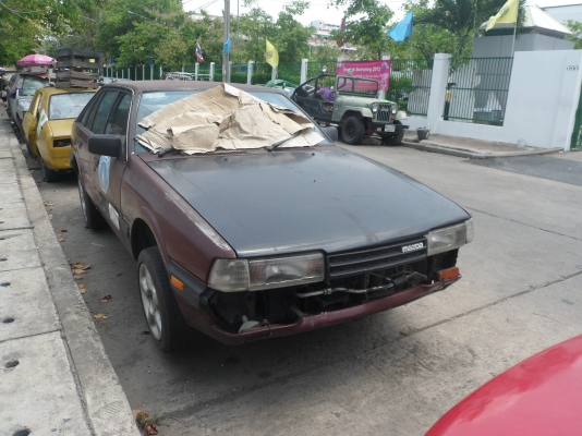 ต้องการขายรถยนต์มาสด้าแดงเพลิงสาพเก่ามากพร้อมใช้