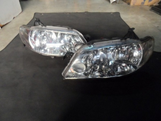 ขาย ไฟหน้ารถยนต์ ซีนอล Mazda 323 Protege xenon ของแท้ ขาย ไฟหน้ารถยนต์ ซีนอล Mazda 323 Protege xenon ของแท้