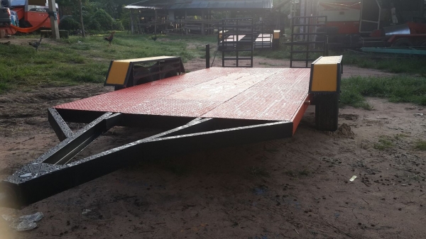 เทลเลอร์รถเกี่ยวข้าว  และแมคโคล