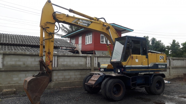 ขายรถแบคโฮ Kobelco sk04ws พร้อมหัวเจาะ,ปุ้งกี๊2ลูก,เอกสารเล่มทะเบียนครับ.