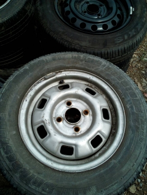 175/70R13  BRIDGESTONE  กะทะพร้อมยาง  ชุด 4 ล้อ tel.081-427-3941