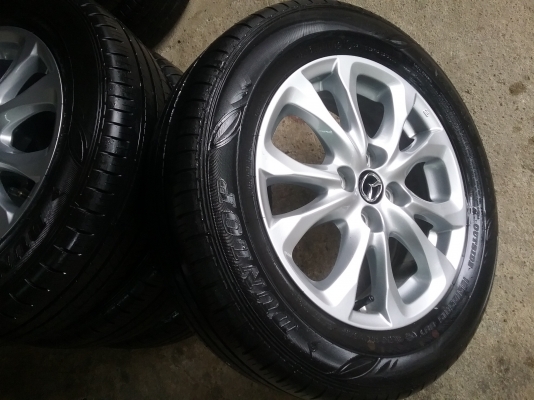 แม็กพร้อมยางป้าแดงมาสด้าสอง 15"ยางสวยดอกเต็มปี2016