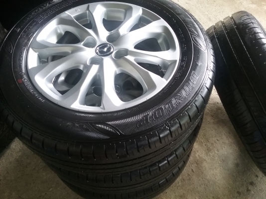 แม็กพร้อมยางป้าแดงมาสด้าสอง 15"ยางสวยดอกเต็มปี2016