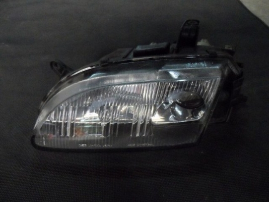 อะไหล่ รถยนต์ มือ สอง ไฟหน้ารถยนต์มือสอง มาสด้า แลนติส MAZDA LANTIS