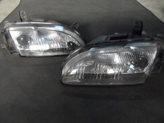 อะไหล่ รถยนต์ มือ สอง ไฟหน้ารถยนต์มือสอง มาสด้า แลนติส MAZDA LANTIS