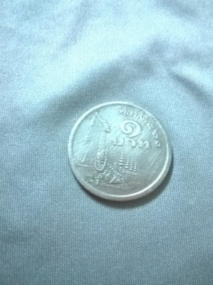 เหรียญ1บาท พ.ศ 2520ราคา5000บาท โทร0924462525โส กทม