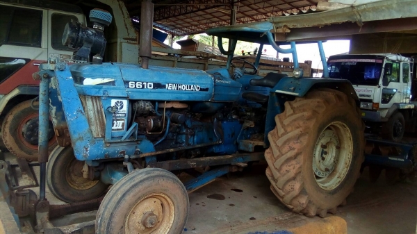 ขาย รถไถ FORD 6600 เสื้อลาย ไม่มีทะเบียน อุปกรณ์มีใบดันหน้า และผาน 7