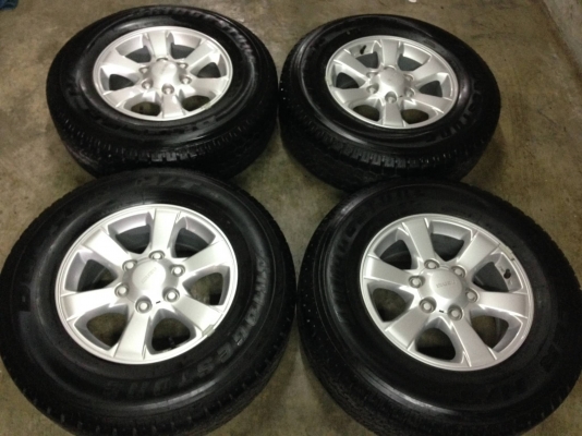 แม็กพร้อมยางป้ายแดง อีซูซุ นิวดีแม็ก 1.9 บลูเพาเวอร์ บริดสโตน 245-70-16 ปี 16