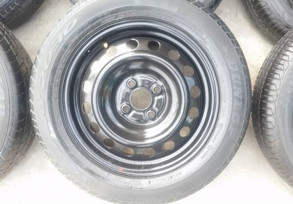 ขายล้อกะทะ15 TOYOTA  4 รู100 พร้อมยางฝาครอบ 4 ล้อ