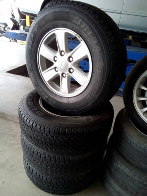 แม๊ก ALL NEW 245/70R16 BRIDGESTONE DUELER ชุด 4 ล้อ tel.081-427-3941