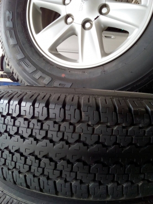 แม๊ก ALL NEW 245/70R16 BRIDGESTONE DUELER ชุด 4 ล้อ tel.081-427-3941