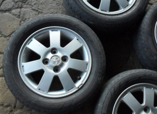 แม็กรถเก๋ง 4รู100 พร้อมยาง บริดสโตน ลงพื้นปี13 (4ล้อ 2,800)