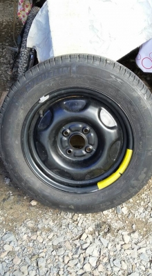 ยางพร้อมกระทะยาง  michelin 4รู 100    185/65 /14