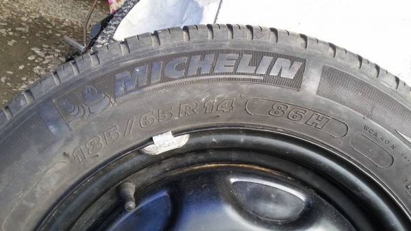 ยางพร้อมกระทะยาง  michelin 4รู 100    185/65 /14