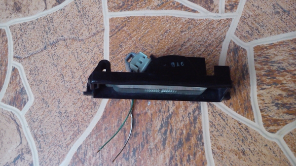 ไฟส่องป้ายทะเบียน ของรถ TOYOTA Koito T82 ไฟส่องป้ายทะเบียน ของรถ TOYOTA Koito T82