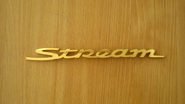 เพลทโลโก้ Stream สีทอง เพลทโลโก้ Stream สีทอง