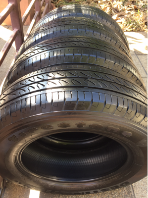 ยางถอดป้ายแดง Firestone 205 70 15 ปี16 ดอกเต็ม ไม่มีปะ ราคาไม่แพง