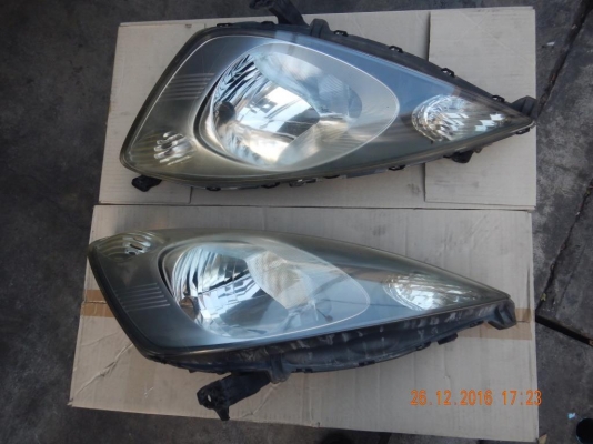 ขายโคมไฟหน้าแท้มือสองHonda  Jazz  สภาพสวย ขาครบไม่หัก 1900บาท