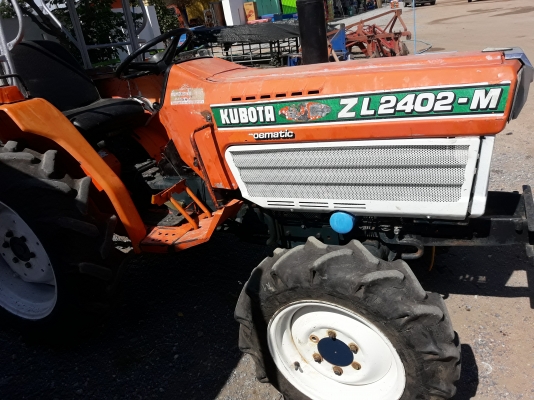 ขายคูโบต้า L 2402DT สองเพลา สภาพสีตัว เปลือก เดิมๆ ระบบเกียร์ เฟื่อง ช่วงหลังใช้งานได้ปกติ