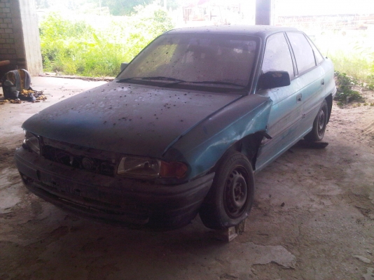 ขายซากรถ OPEL ASTRA สีเขียว ปี 94 พร้อมทะเบียน 25,000