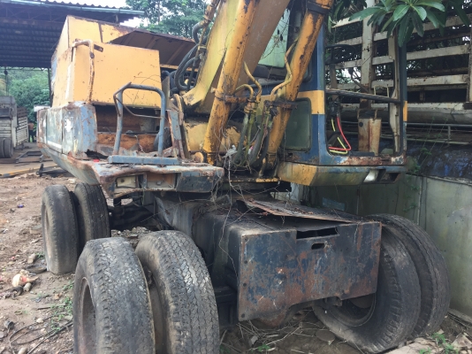 รถขุดล้อยาง PW100-3 ซื้อรถนอกมาจอดทิ้งไว้ข้างโกดัง มีลายเจาะ.. เสร็จงานแล้วจอด มีเอกสาร..