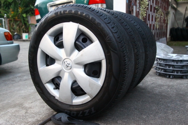 กะทะ15 4รู100 + ยาง Firestone 185/60/15 ปี12