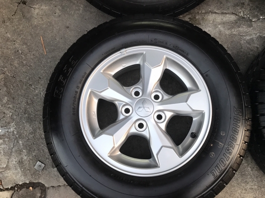 ล้อแม็กใหม่ป้ายแดง Mitsu Triton พร้อมยาง 215-70-15 Bridgestone ปลายปี 16 ล้อแม็กใหม่ป้ายแดง Mitsu Triton พร้อมยาง 215-70-15 Bridgestone ปลายปี 16